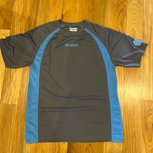 UNC athletic shirt and shorts set.